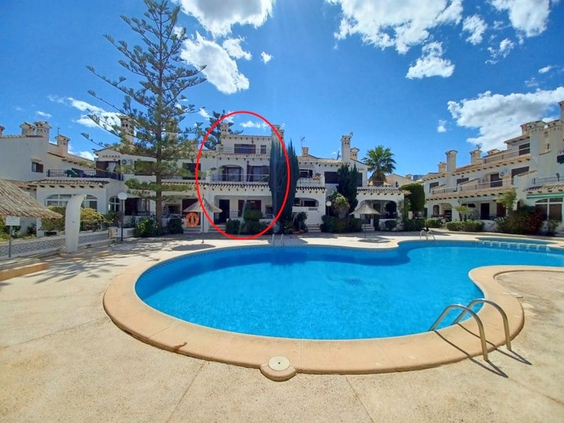 Mediterranean style house with 4 bedrooms, 2 bathrooms overlooking the communal pool just 500 metres to the beach in Cabo Roig.